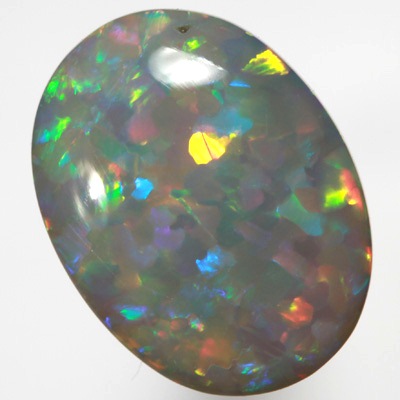 SOLID SEMI BLACK OPAL Bright fire in a rare Jigsaw pattern SEE VIDEO